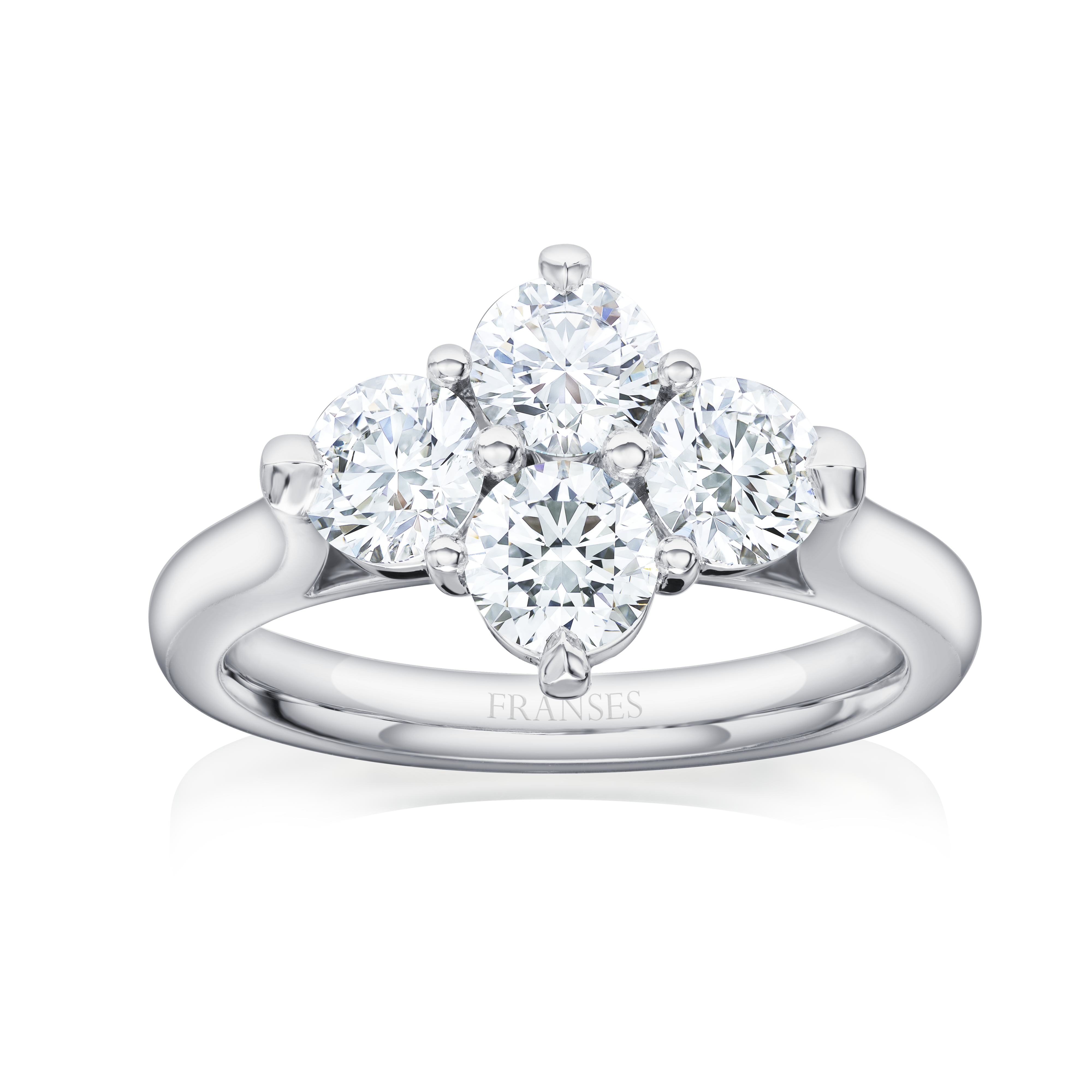 Diamond ring with three clear gemstones on a white background
