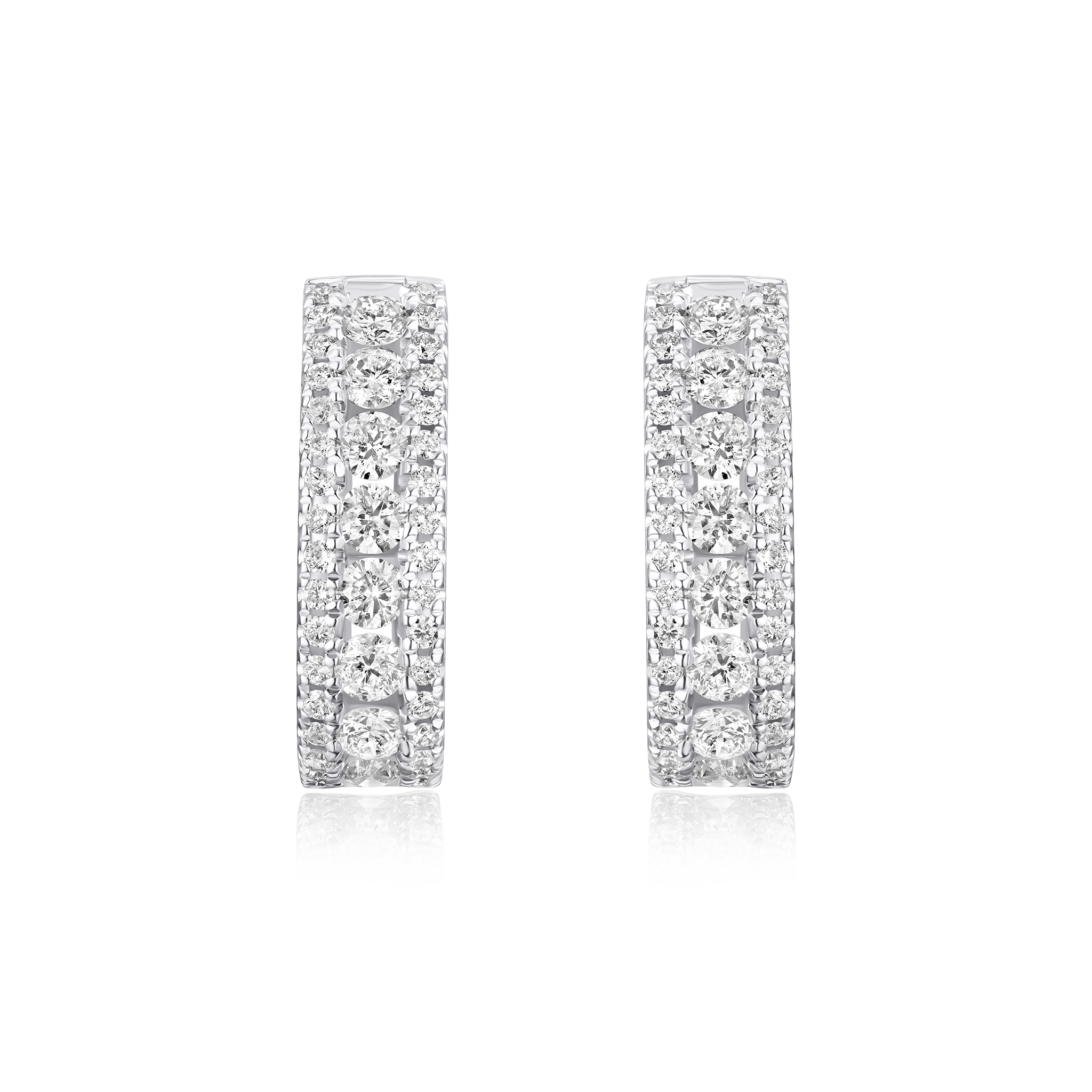 Pair of diamond hoop earrings on a white background
