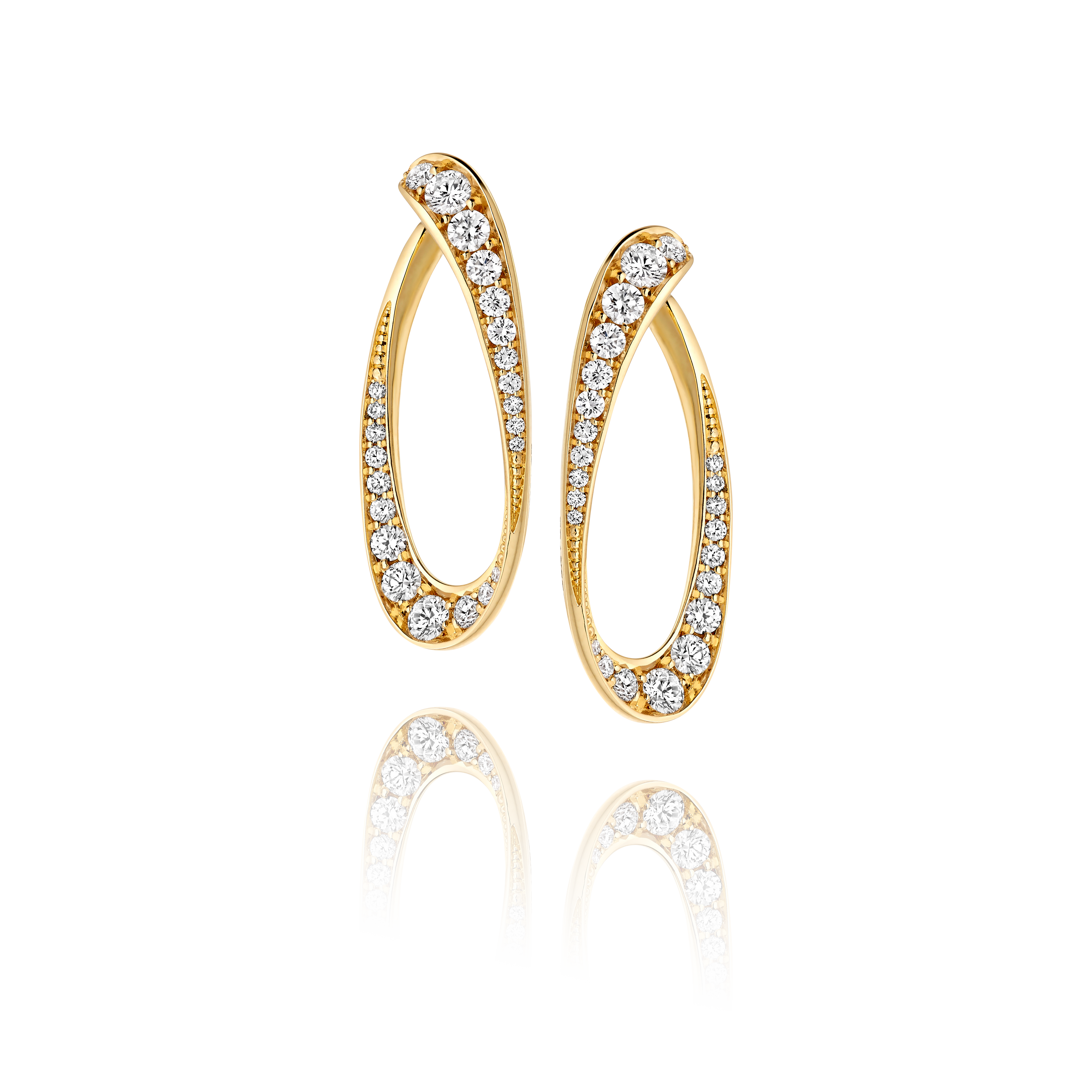 Gold hoop earrings with clear gemstones on a white background