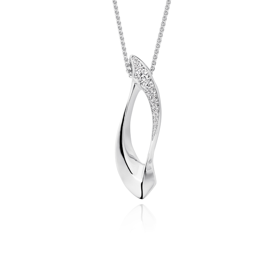 Silver necklace with a wave-shaped pendant on a white background