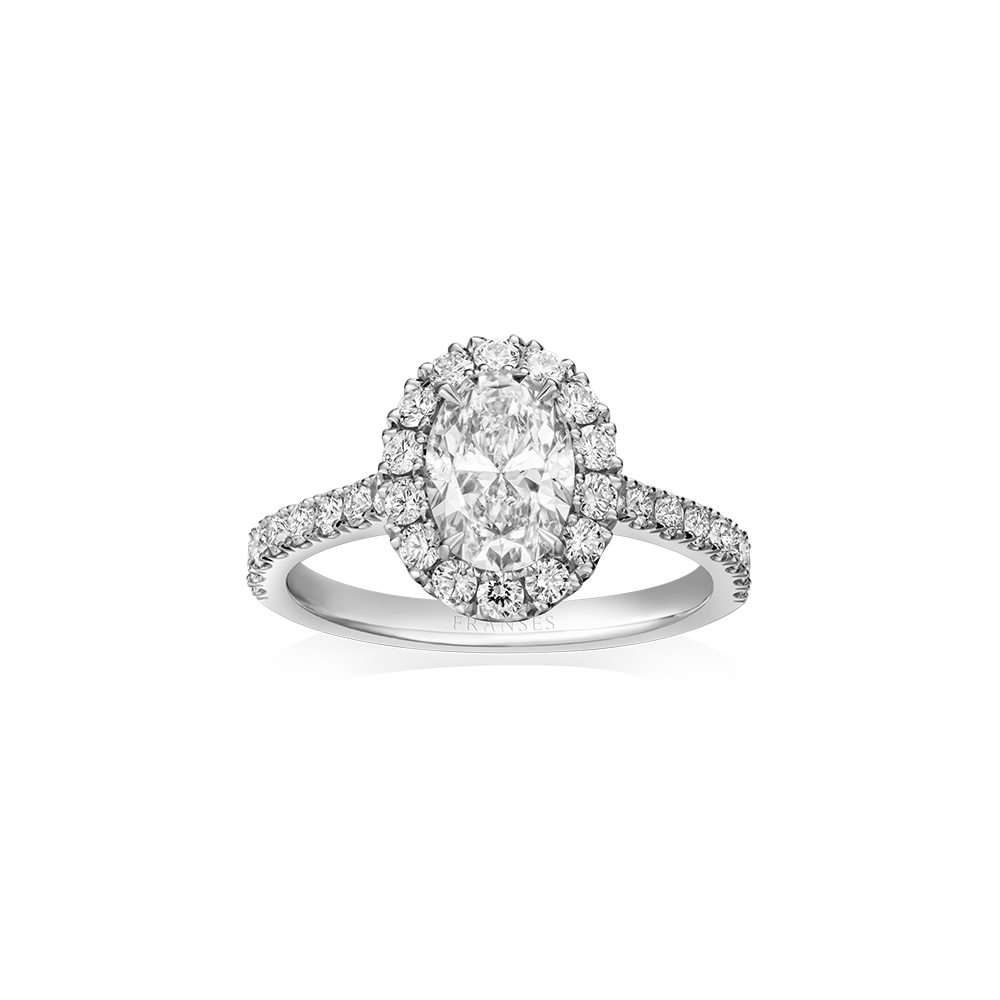 Diamond ring with a pear-shaped center stone on a white background