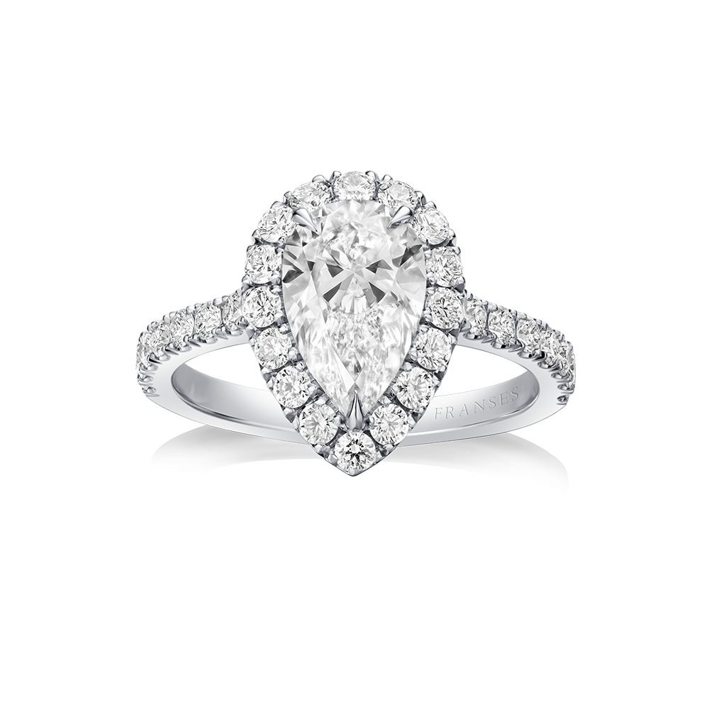 Diamond ring with pear-shaped center stone on a white background