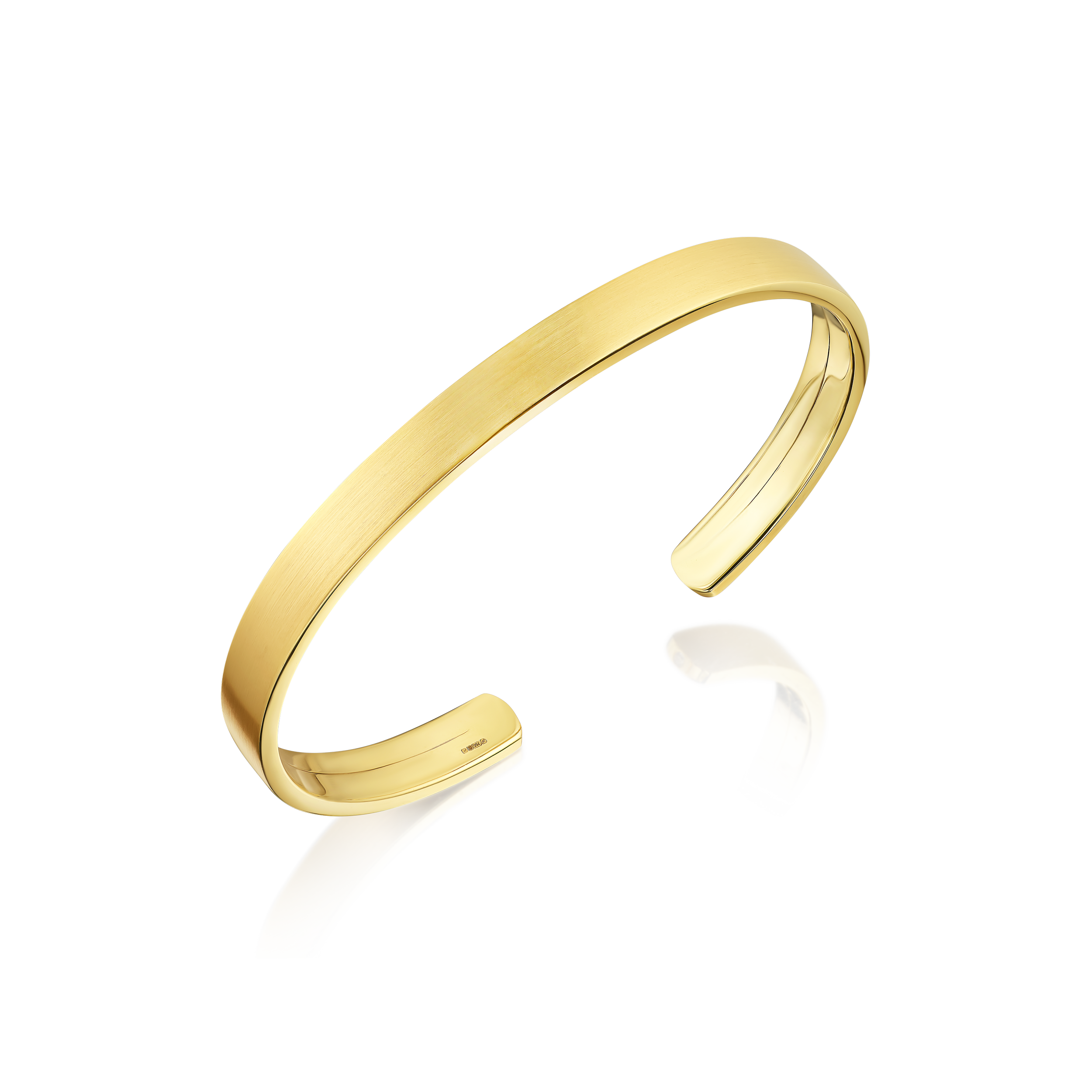 Men's gold bangle on a white background