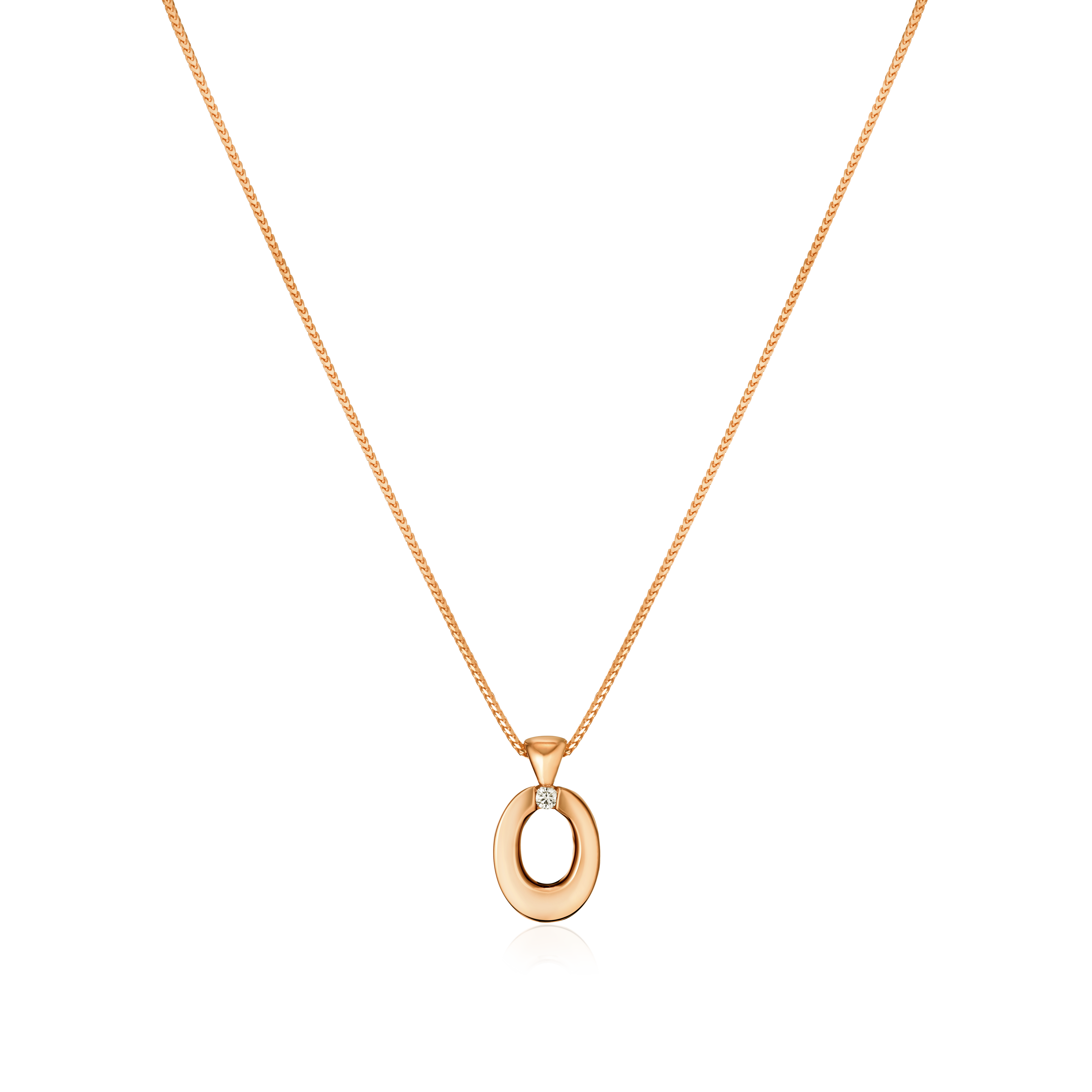 Gold necklace with a pendant on a white background