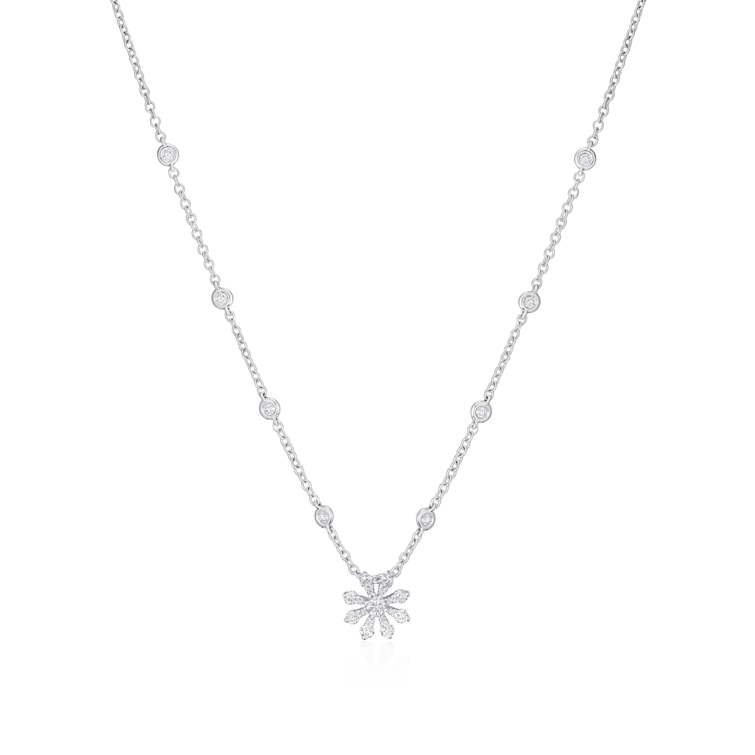 Silver necklace with a floral pendant on a white background
