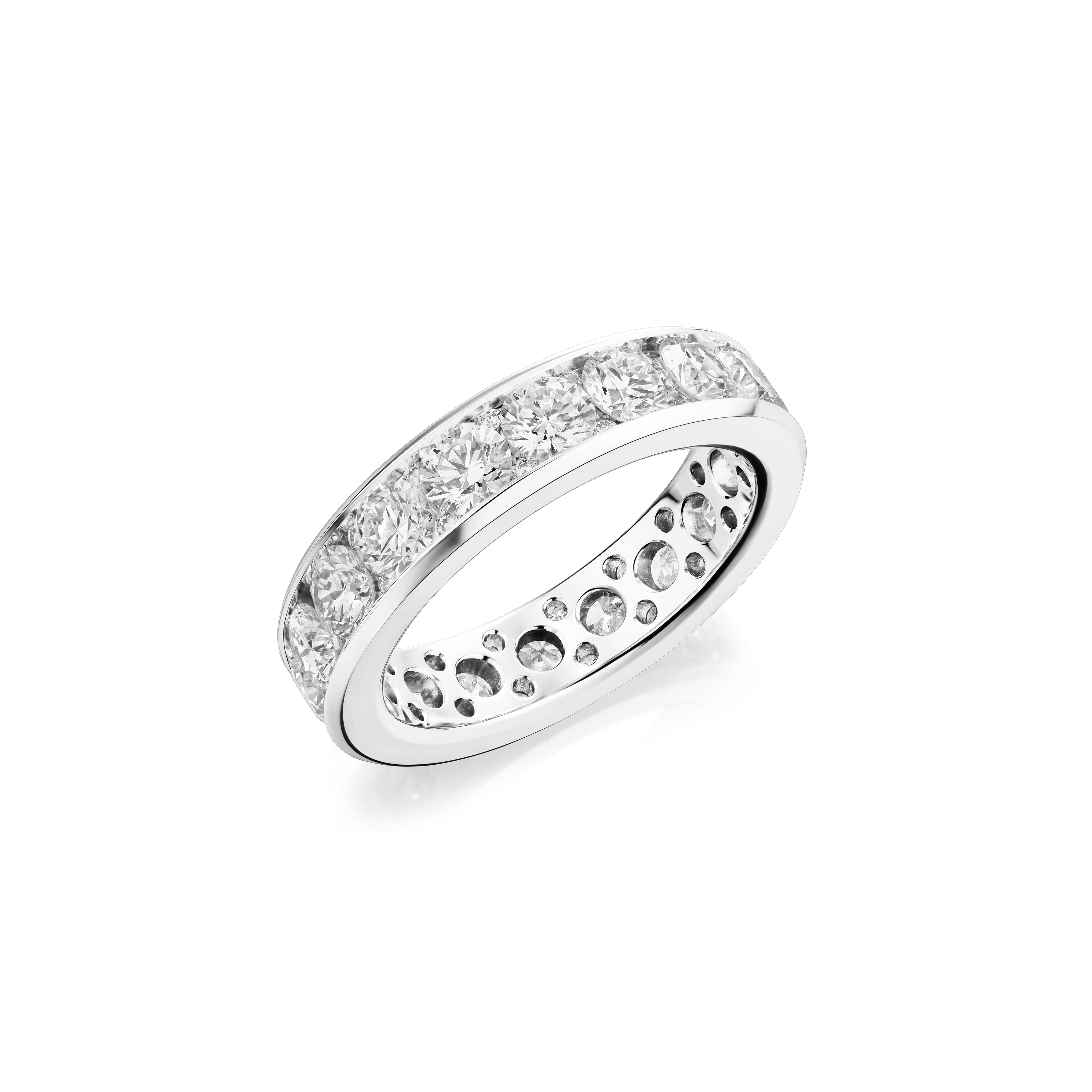Silver ring with embedded diamonds on a white background