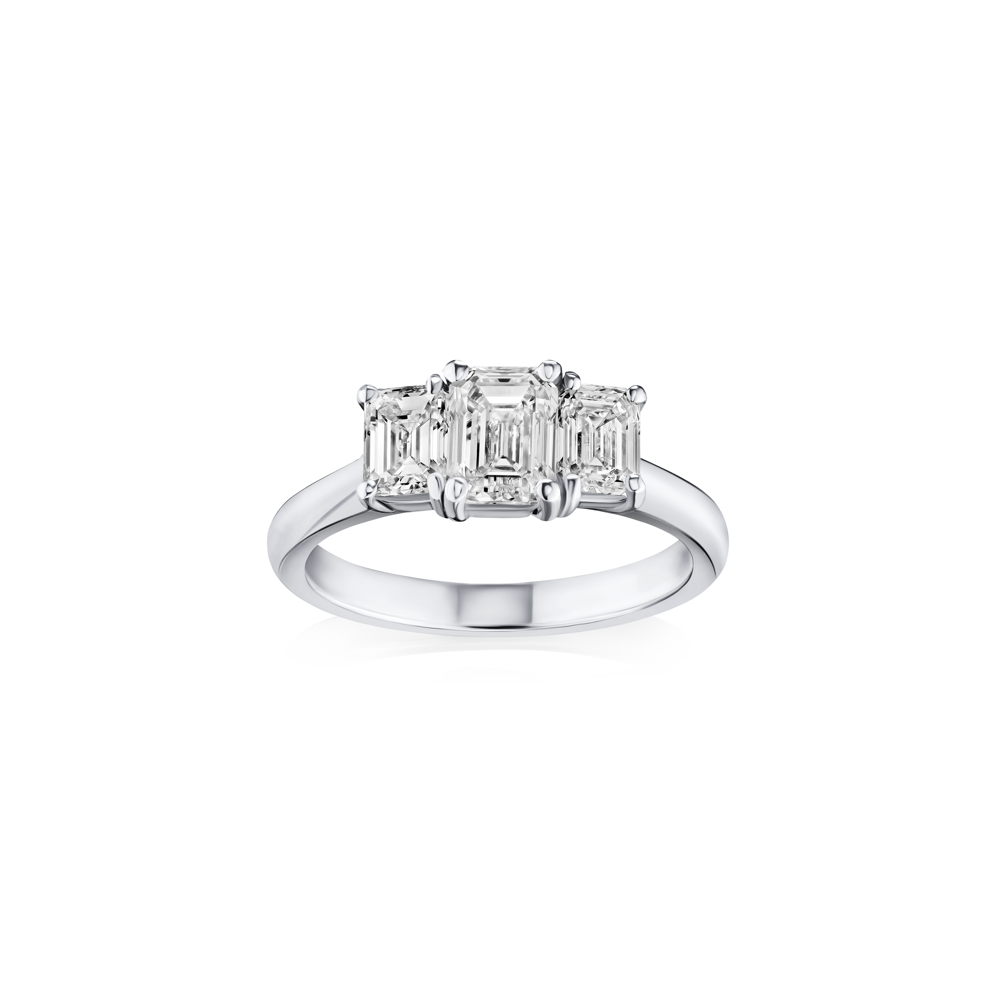 Diamond ring with three emerald-cut diamonds on a white background