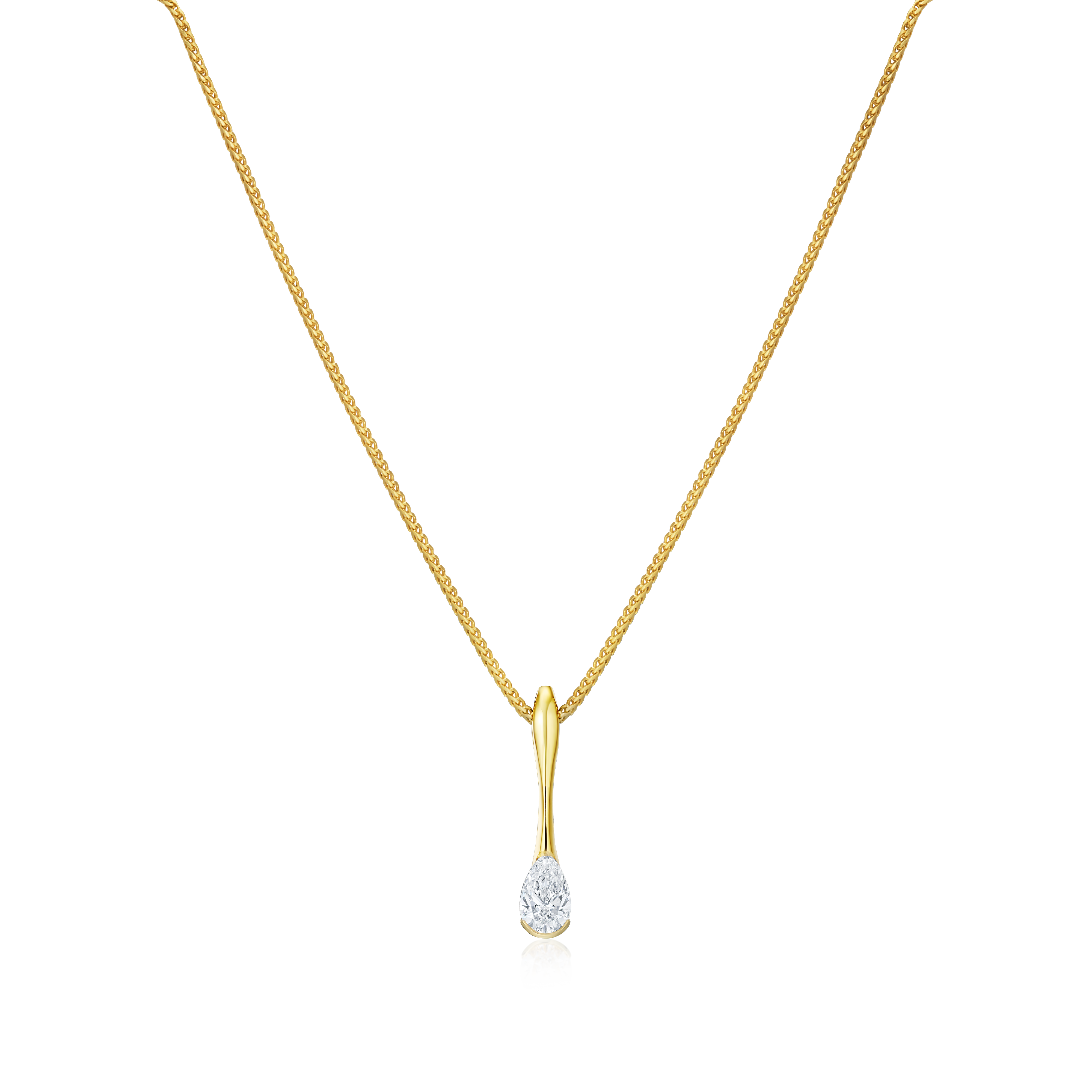 Gold necklace with a diamond pendant on a white background