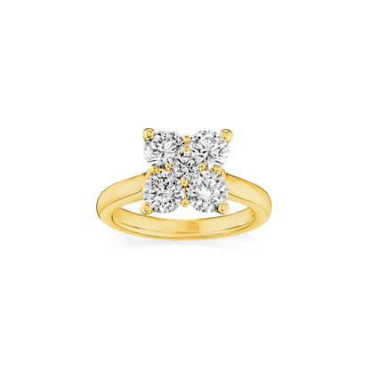 Gold ring with three diamonds on a white background