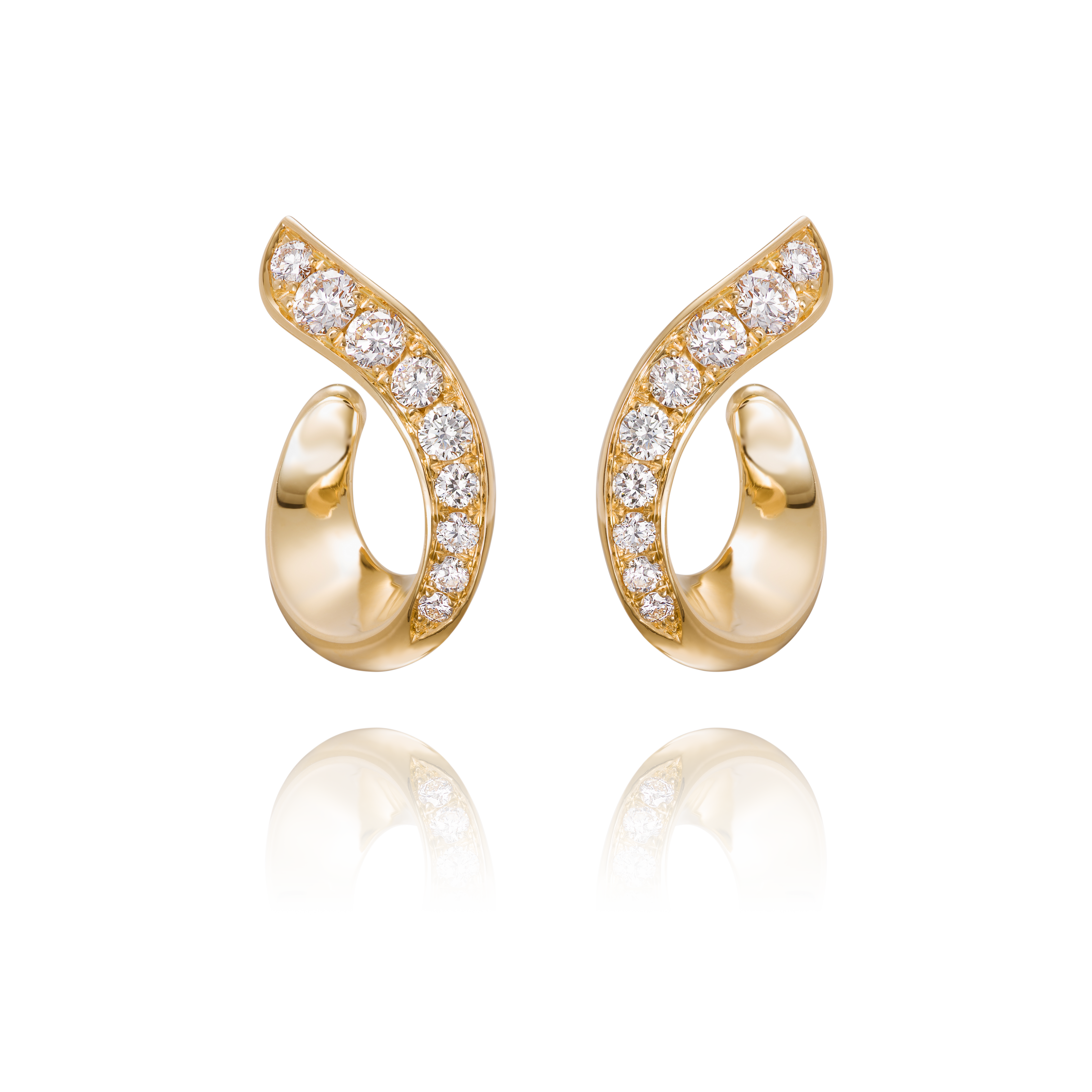 Pair of gold earrings with diamond accents on a transparent background