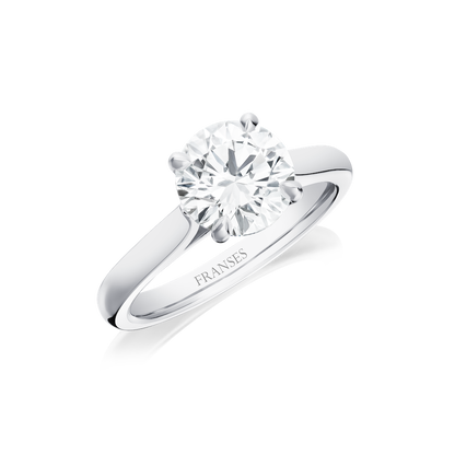 Diamond ring with 'Frannes' branding on a white background