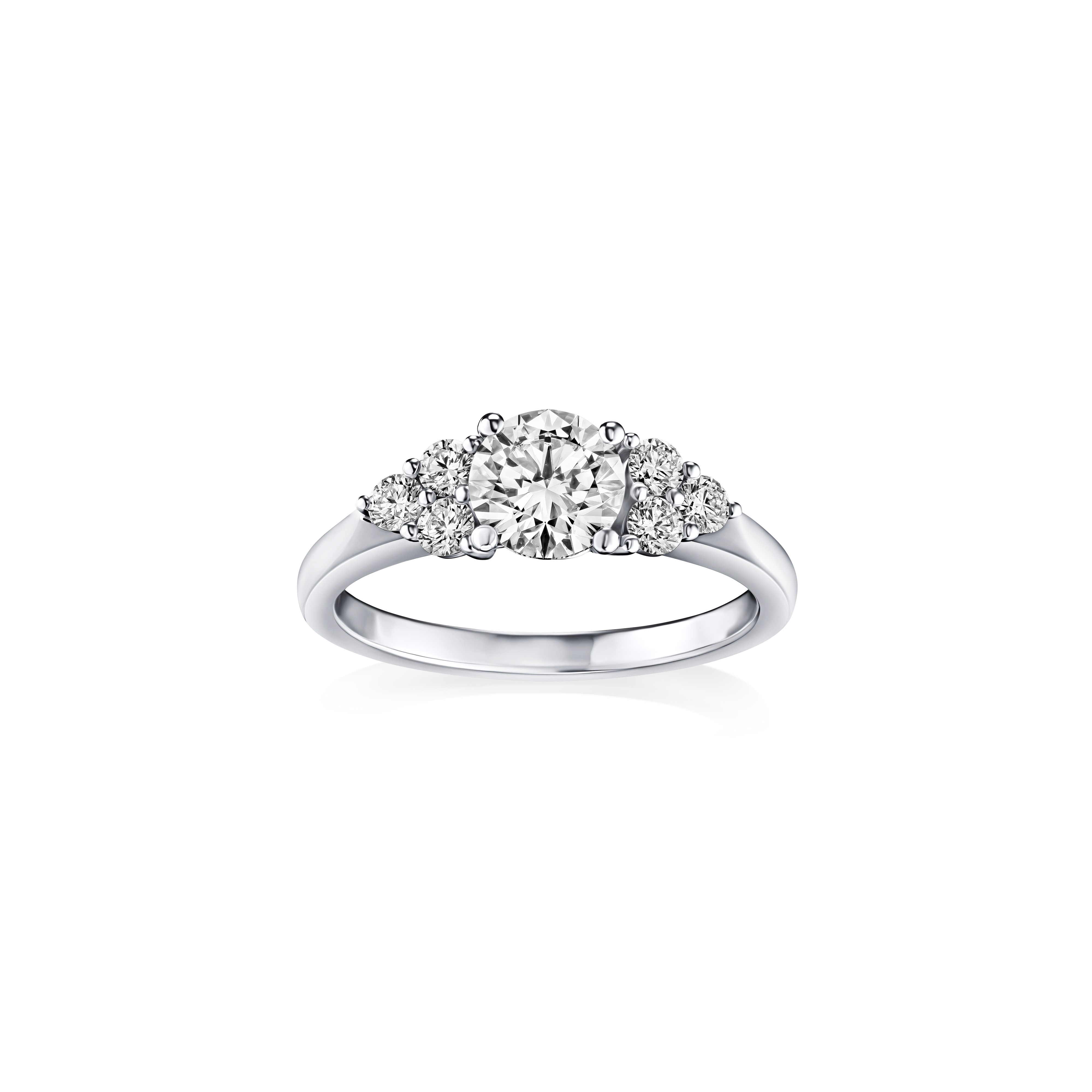 Diamond ring with three stones on a white background