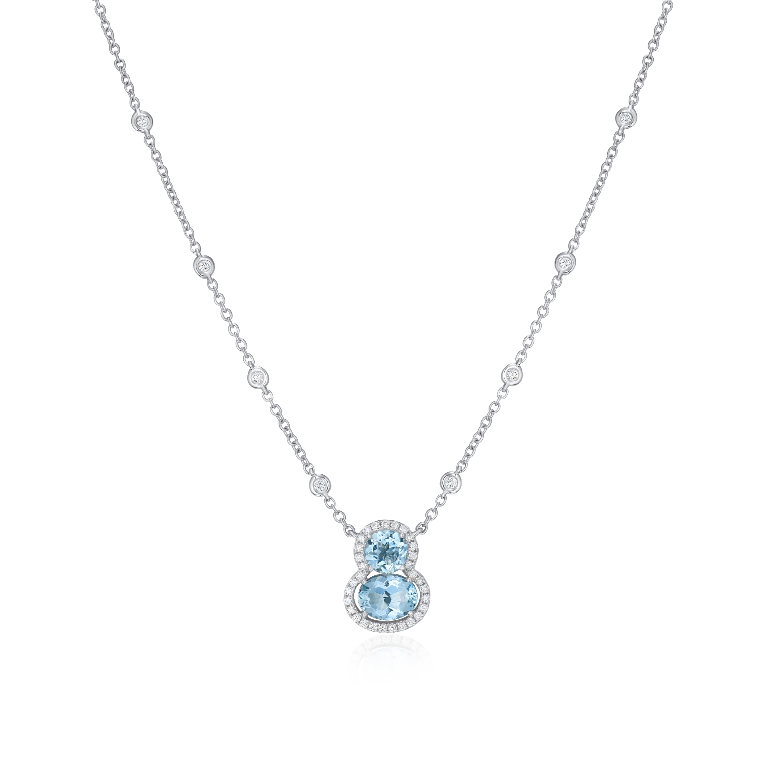 Silver necklace with a blue gemstone pendant on a white background
