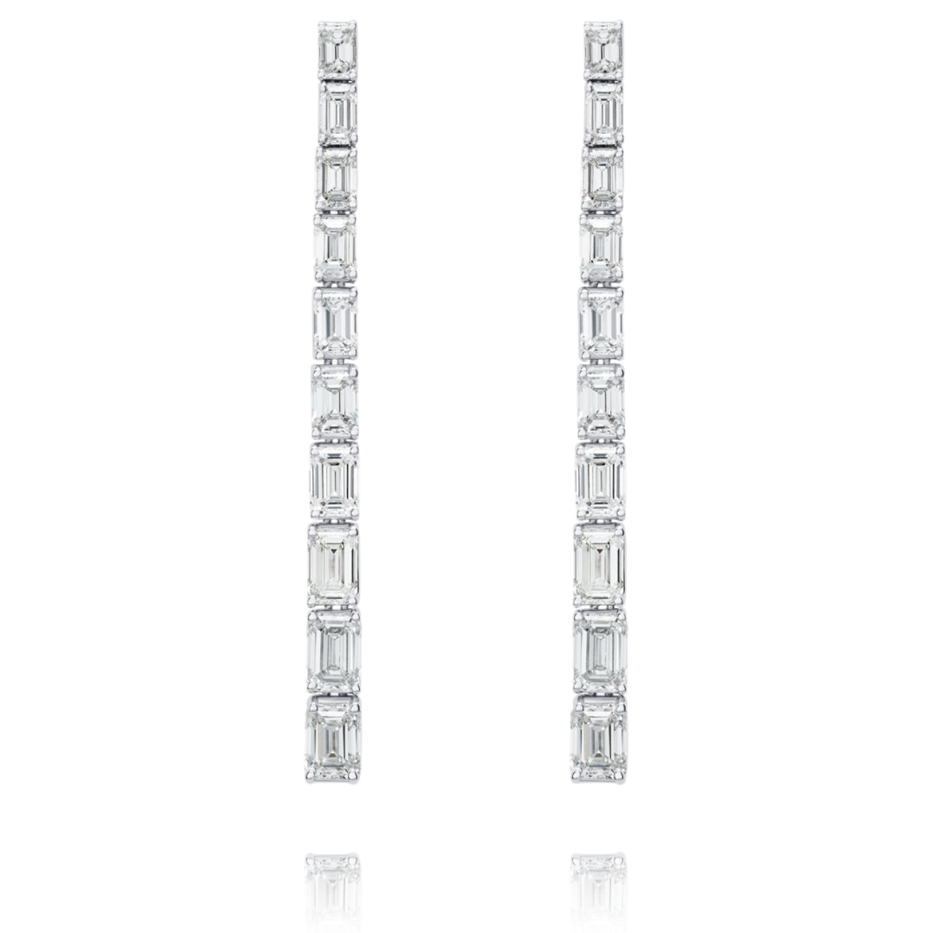 Pair of diamond earrings on a white background