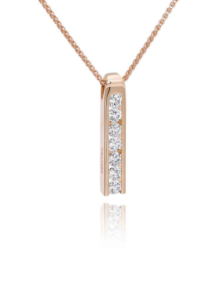 Rose gold necklace with a vertical diamond pendant on a white background