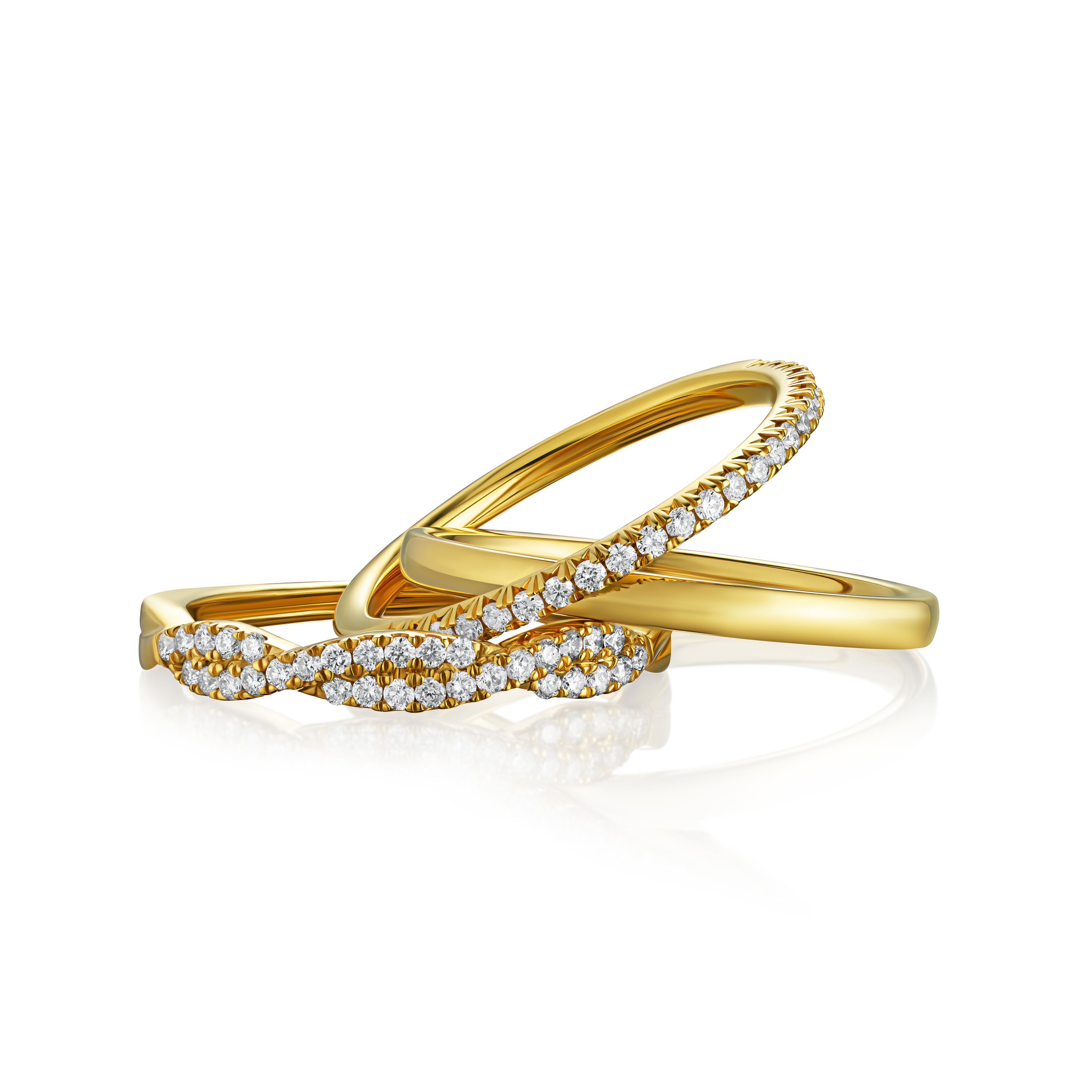 Two gold rings with diamond accents on a white background
