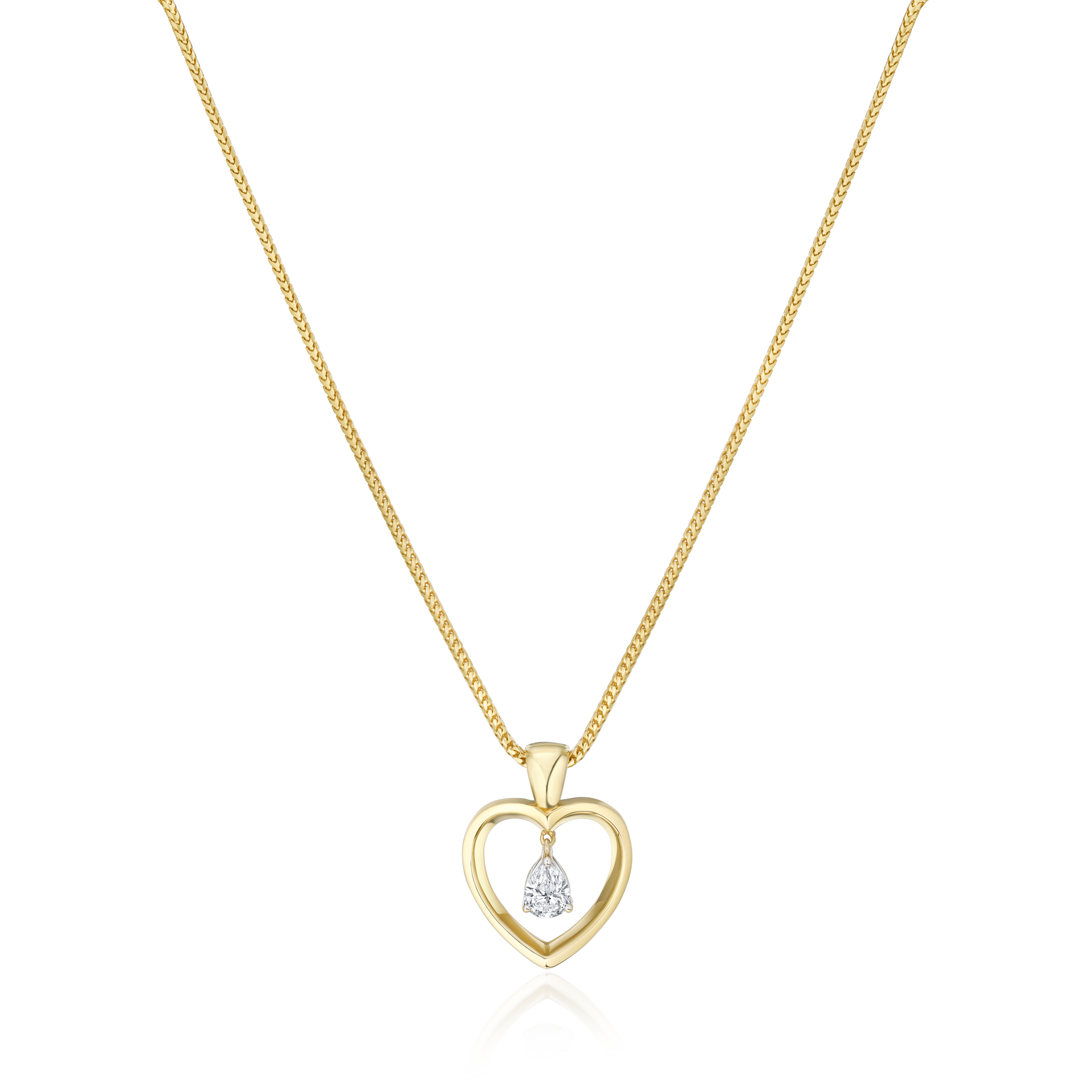 Gold heart-shaped necklace with a diamond on a white background