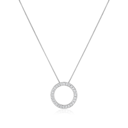 Silver necklace with a round pendant on a white background