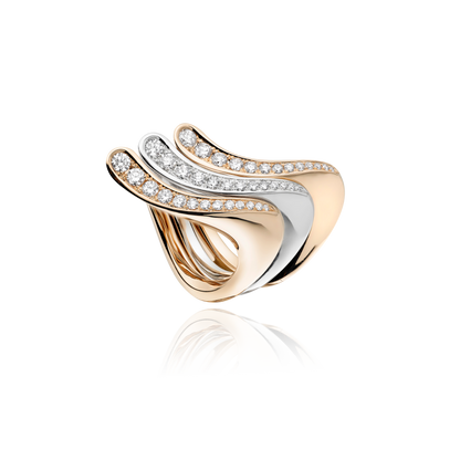 Gold and silver ring with diamond accents on a white background