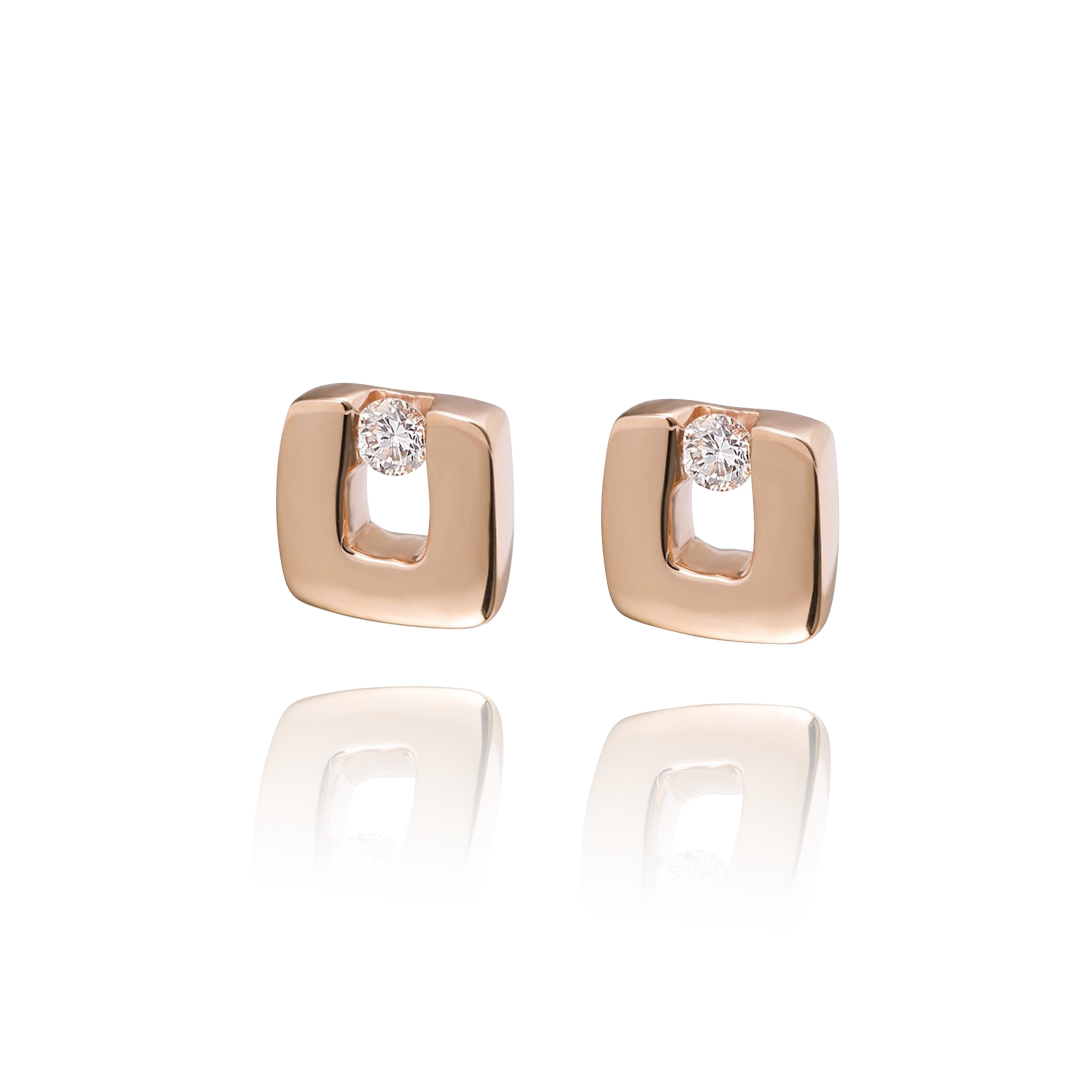 Four rose gold square earrings with clear gemstones on a white background