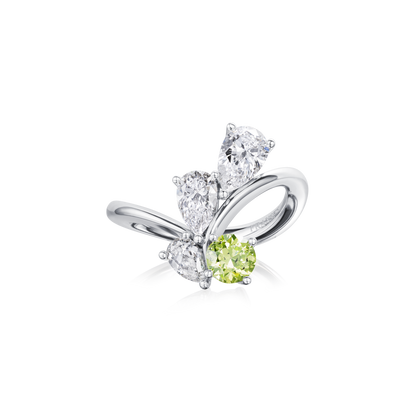 Silver ring with green gemstone on a white background