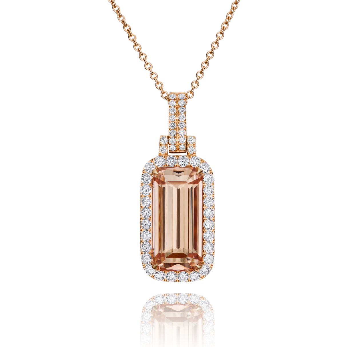 Rose gold pendant necklace with a large brown gemstone on a white background