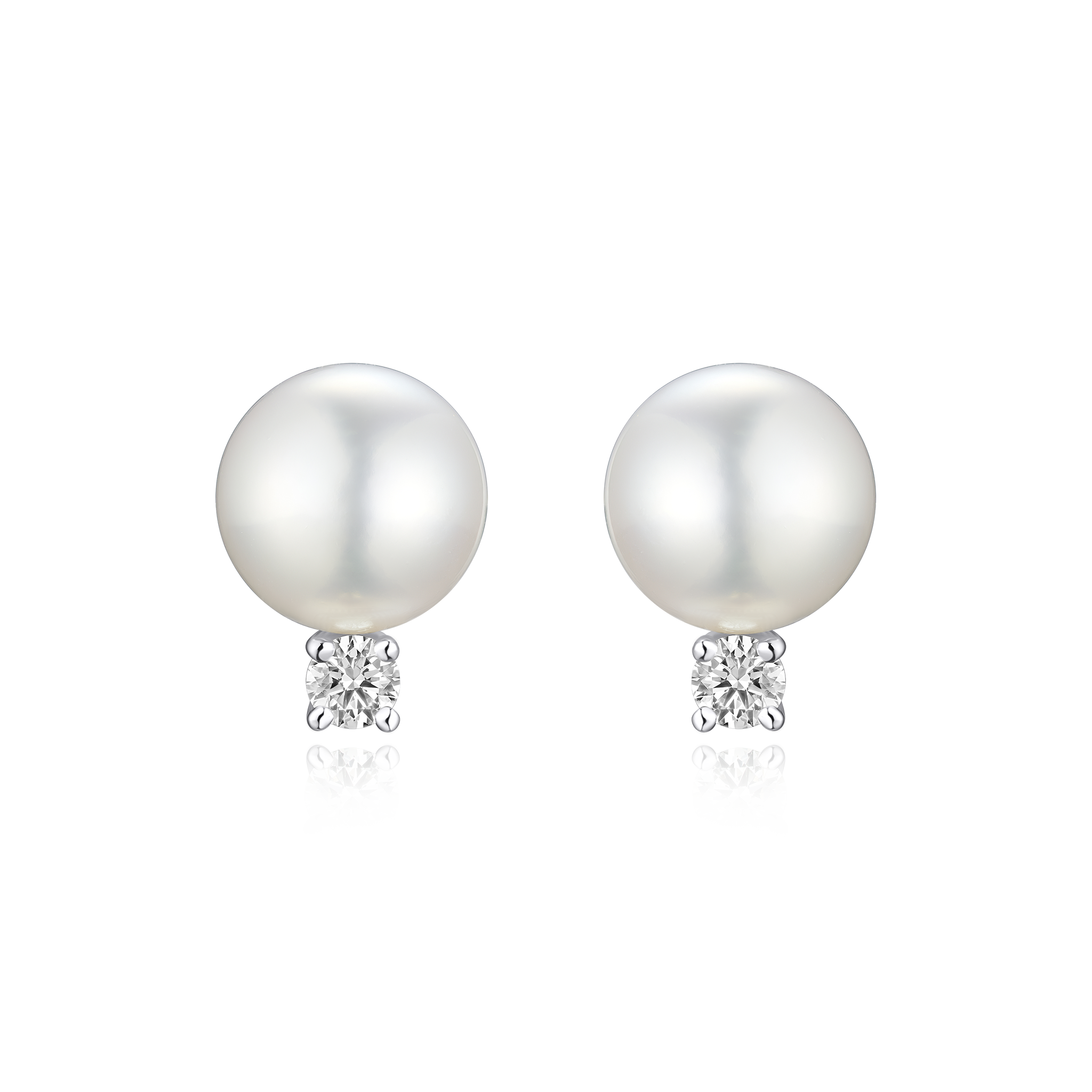 Pearl earrings with small diamond-like stones on a white background