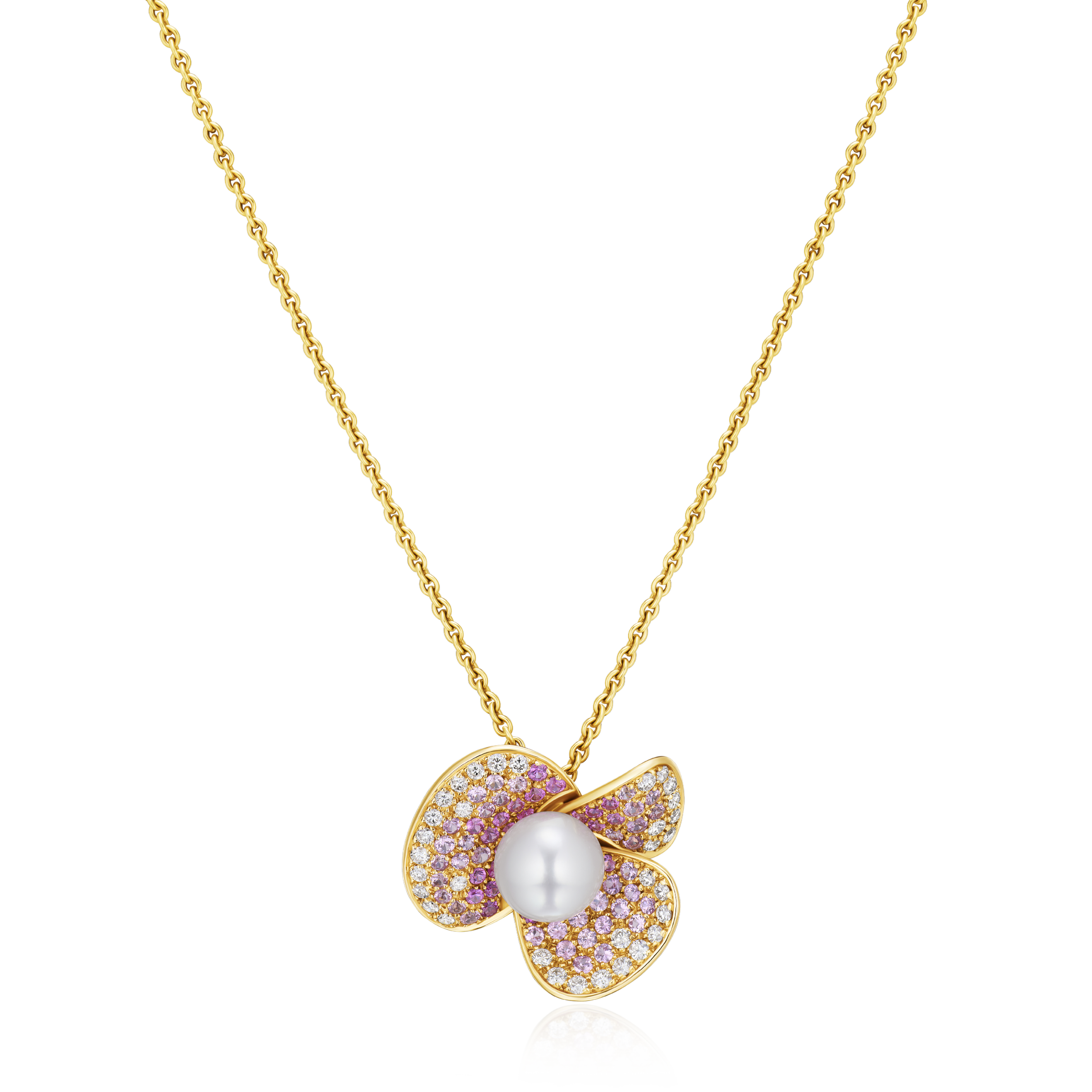 Gold necklace with a pendant featuring a pearl and pink gemstones on a white background