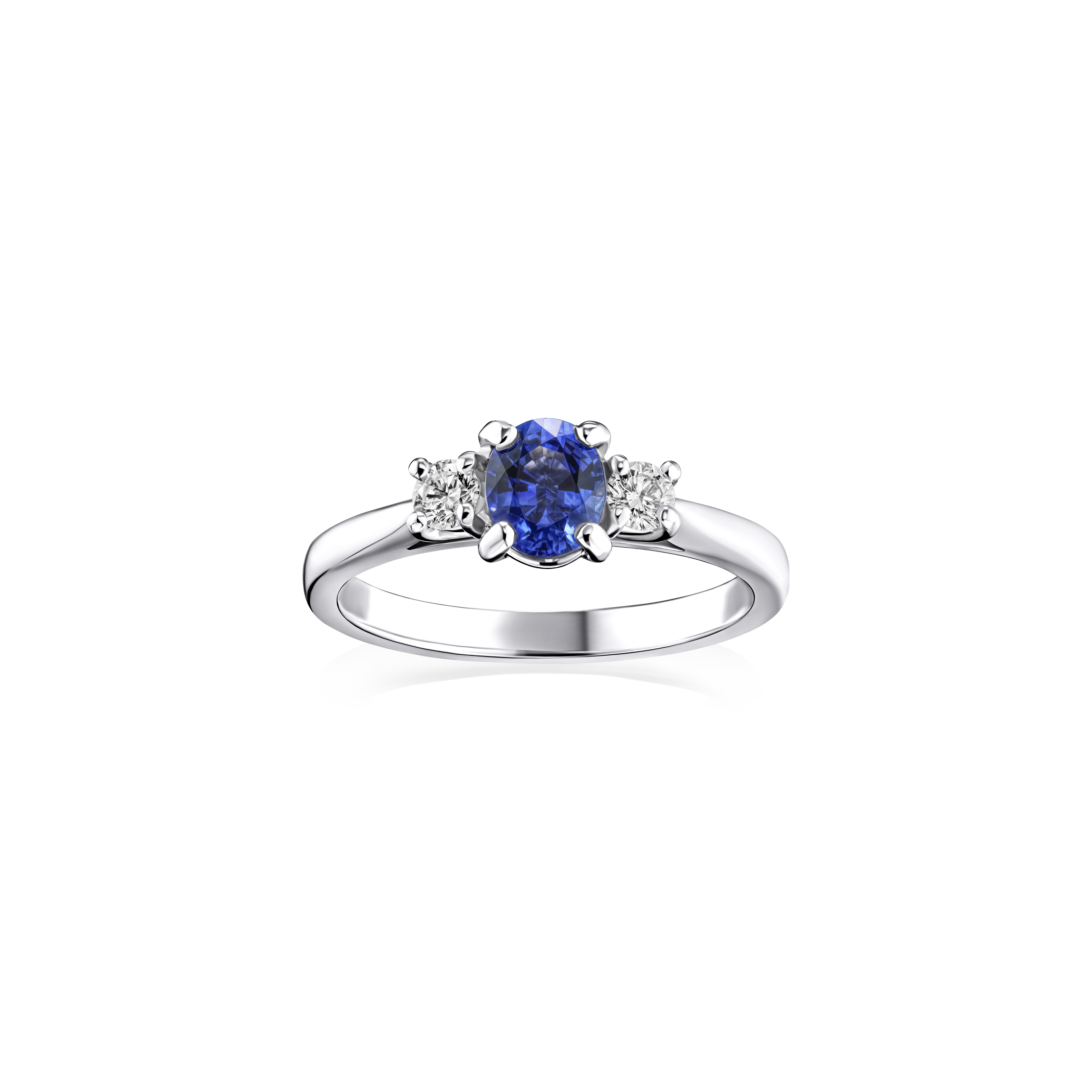Silver ring with a blue gemstone and two smaller diamonds on a white background