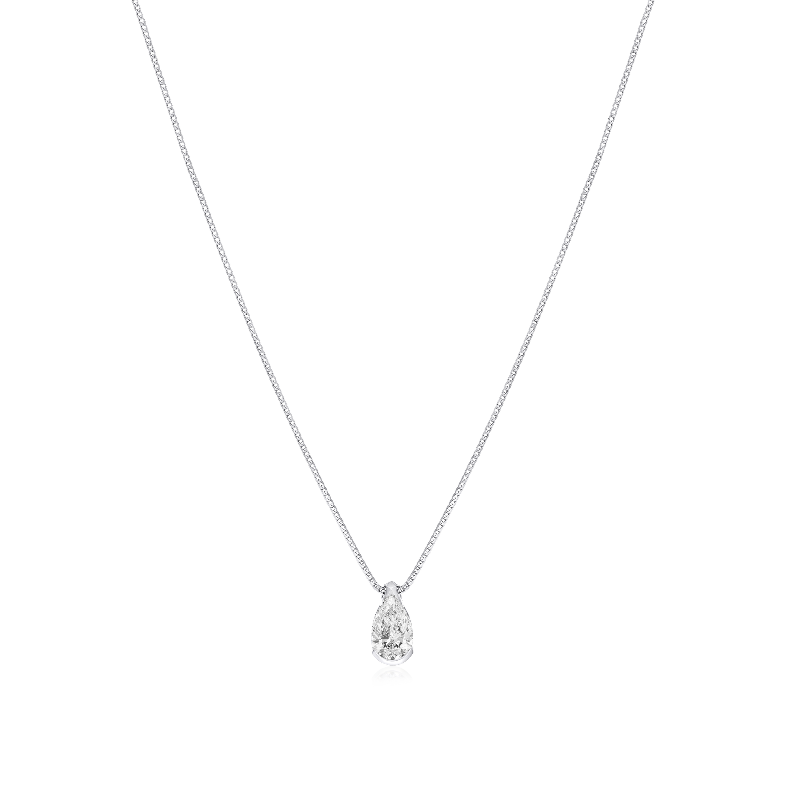 Silver teardrop pendant necklace on a white background