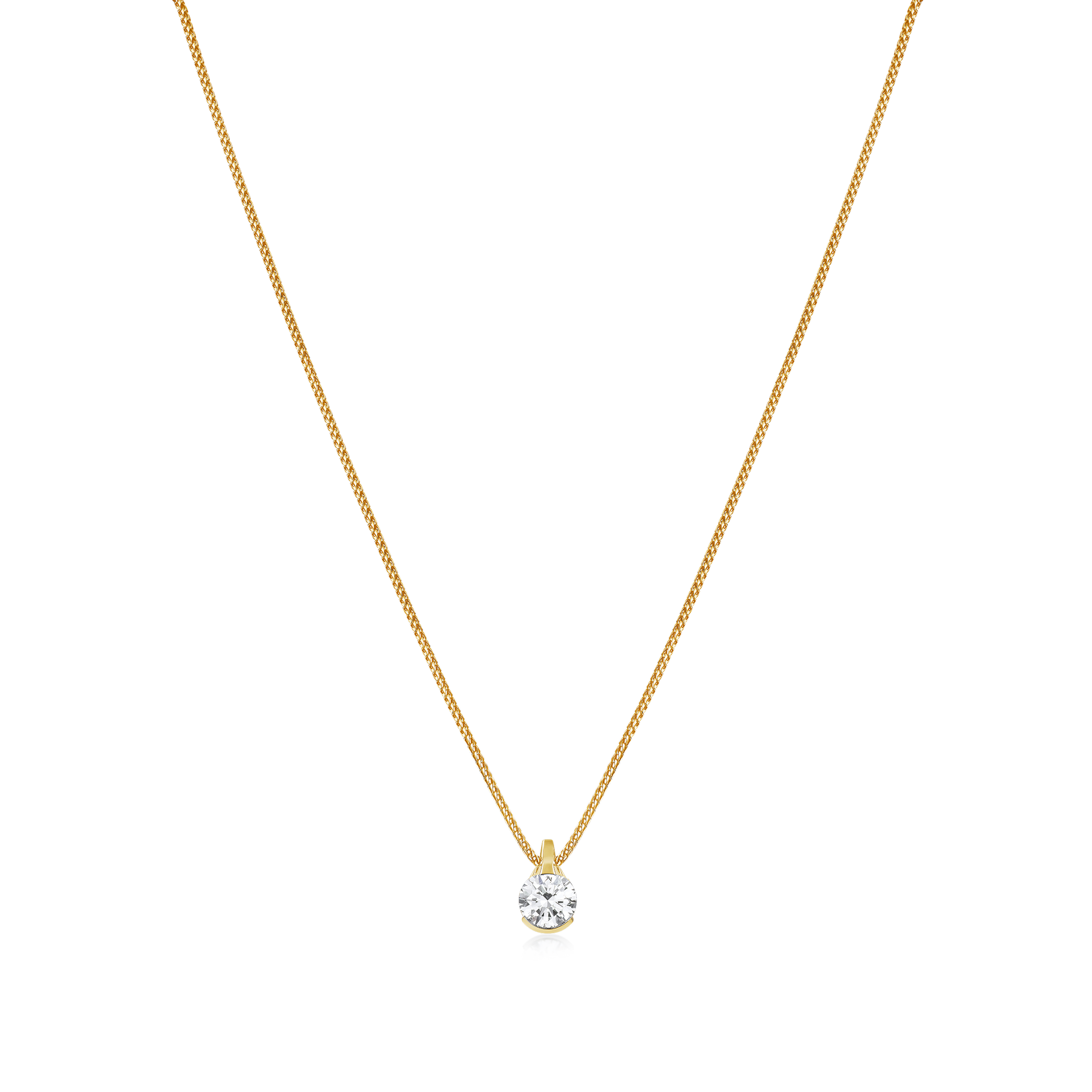 Gold necklace with a clear gemstone pendant on a white background