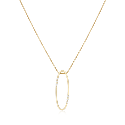 Gold necklace with an oval pendant on a white background