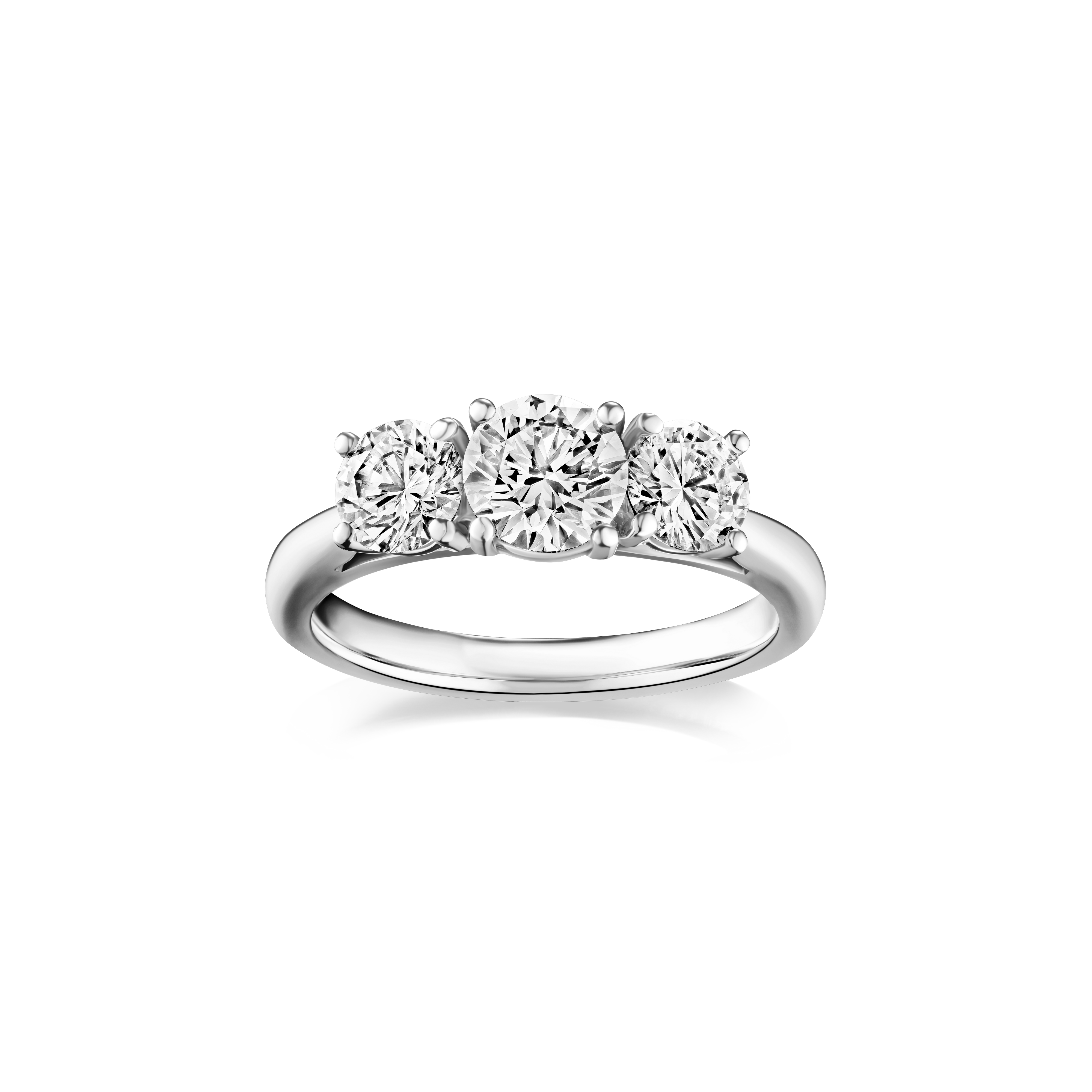 Diamond ring with three stones on a white background