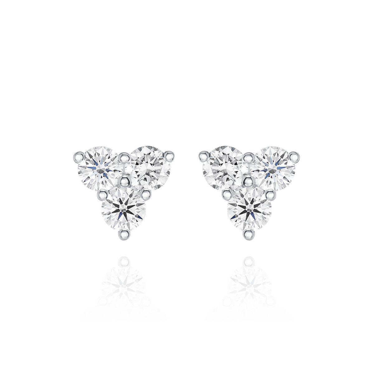 Pair of triangle-shaped diamond earrings on a white background