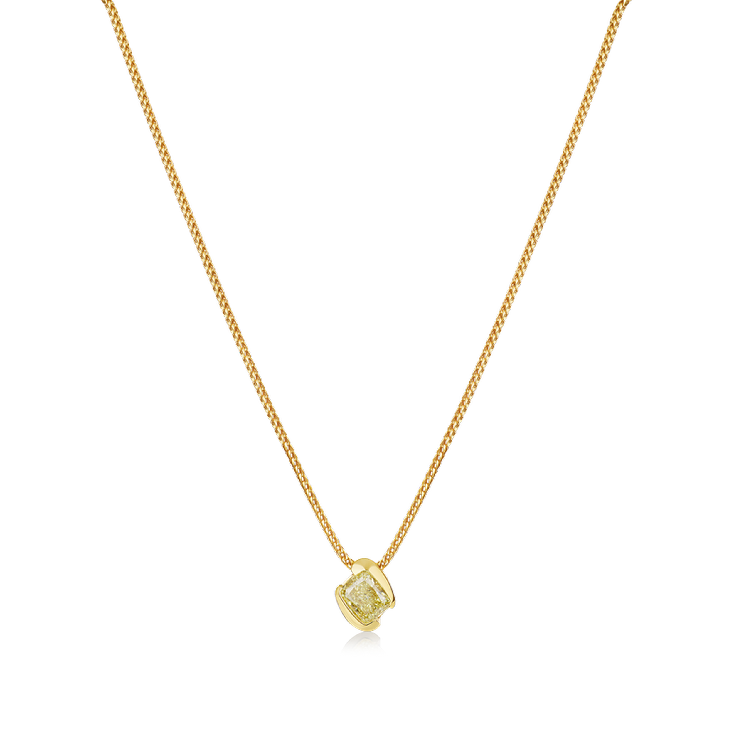 Gold necklace with a heart-shaped green gemstone pendant on a white background