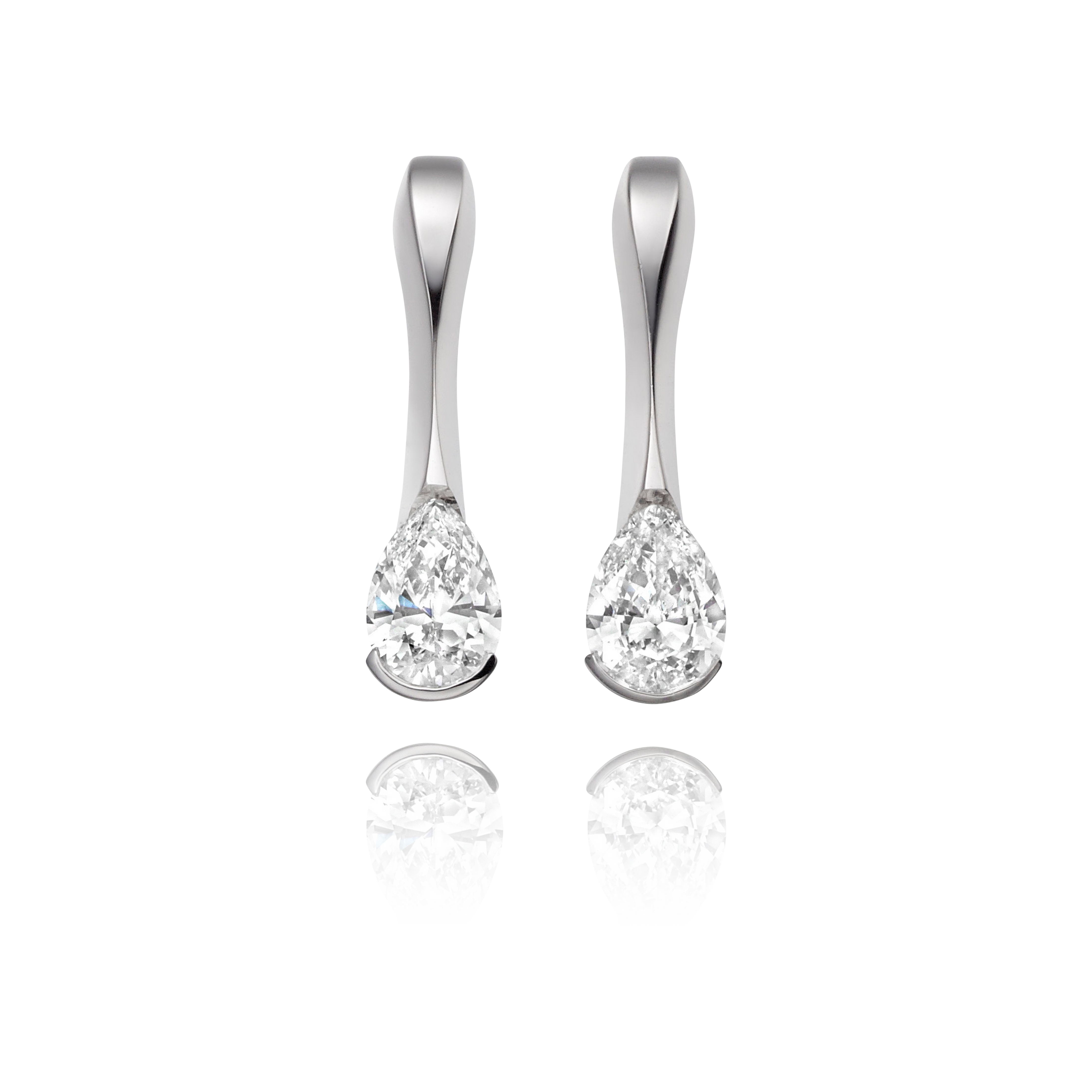 Pair of silver drop earrings with clear gemstones on a white background
